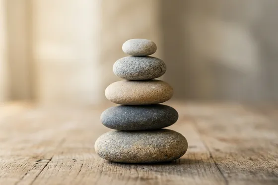 Balanced JustBob customer reviews: zen stones symbolising honest evaluation